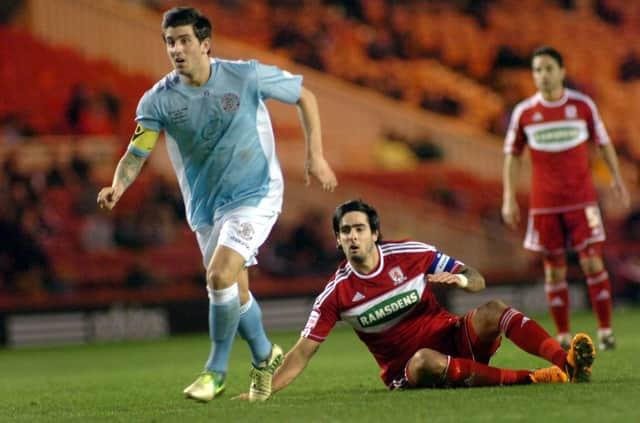 Lee Carey in action for Hastings United against Middlesbrough. Picture by Justin Lycett