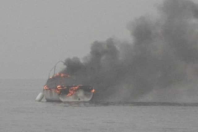 The moment lifeboat crews arrived at a boat blaze off the coast of Littlehampton           PHOTO: Eddie Mitchell