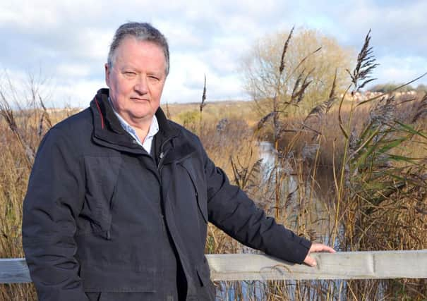 28/11/12- Author Nick Austin at the site in Combe Haven where he believes a Norman Longboat may be.