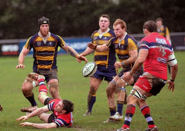 Scott Barlow, Dan Sargent and James Chisholm in action against Doncaster last week