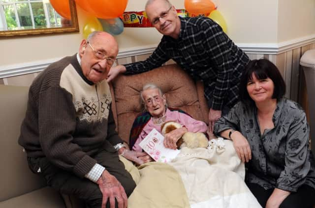 Ethel Bull with son James, grandson Alan and granddaughter-in-law Joanna   Photo by Steve Cobb