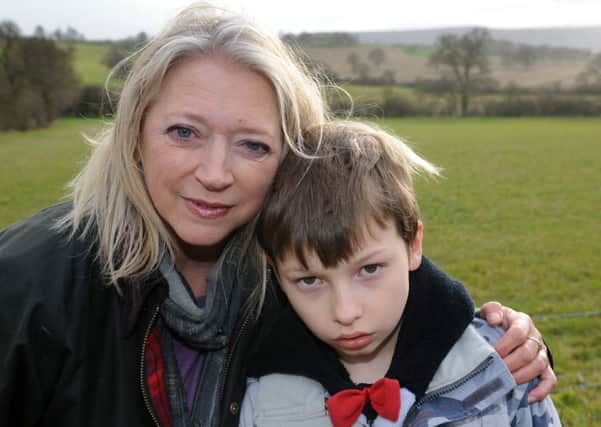 JPCT 250214 S14090490x Ashurst, Steyning solar farm proposal. Anita Rudkin and grandson Joseph -photo by Steve Cobb