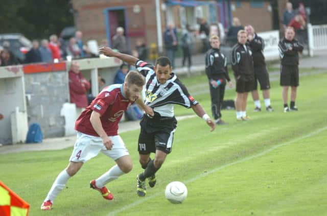 Matt Darby in the thick of the action during Hastings United's 3-1 win over Tooting & Mitcham United in the reverse fixture. Picture by Simon Newstead