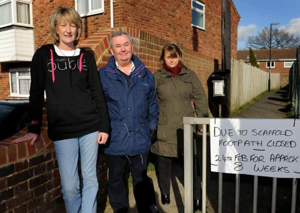 Footpath next to old Kings Head Pub site due to close for 8 weeks. Ginny Heard, Phil Revis and Cherry Katharine. Pic Steve Robards