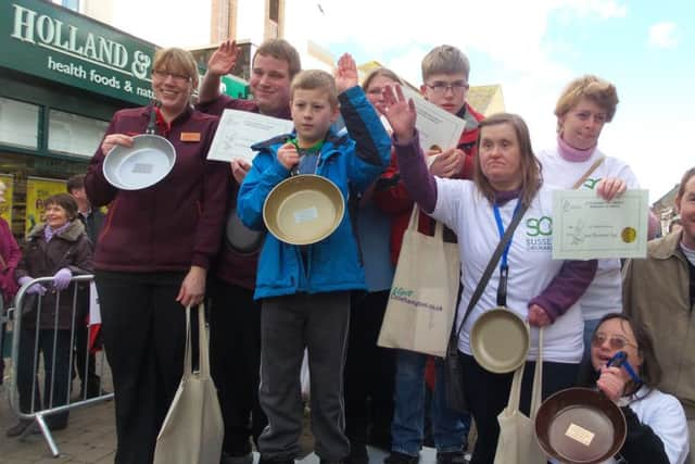 The top three teams at the Littlehampton Pancake Olympics SUS-140103-142738001