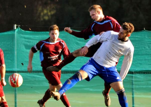 1/3/14- Little Common vs Broadbridge Heath football action SUS-140103-171644002