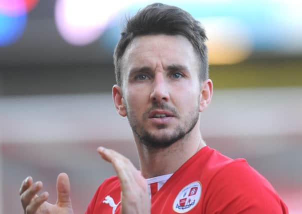 Crawley's Matt Tubbs scores from the penalty spot to win against Peterborough Utd (Pic by Jon Rigby) SUS-140303-144532002