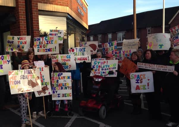 Campaigners gather outside Arun's Civic Centre to protest against new council houses being built in Wick