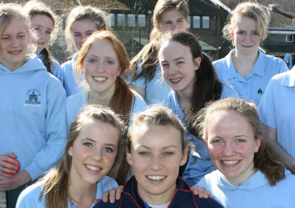 Olympian Chloe Rogers with Farlington girls SUS-141103-144106001