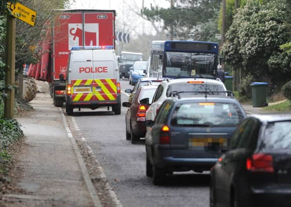 JPCT 110314 S14110921x Farthings Hill, Horsham. Unloading vehicle  causing traffic congestion -photo by Steve Cobb SUS-141103-123039001