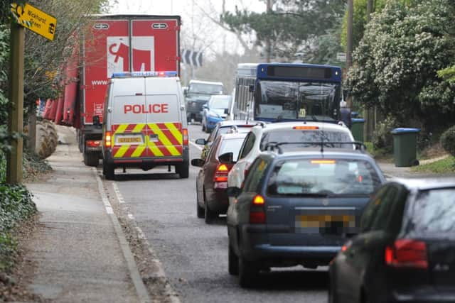 JPCT 110314 S14110921x Farthings Hill, Horsham. Unloading vehicle  causing traffic congestion -photo by Steve Cobb SUS-141103-123039001