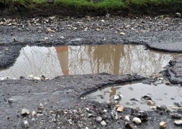 Cash for potholes.