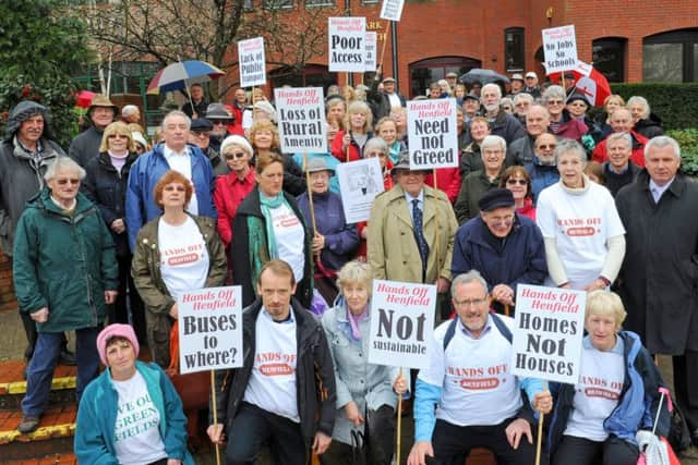 JPCT 250314 Hands off Henfield demonstration at start of public appeal on 160 homes. Photo by Derek Martin PPP-140325-112728003