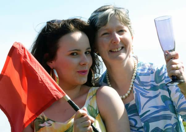 Anne Anderson and Emma Millard ready to tee-off for Stage-Door Theatre Company's latest production