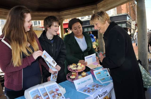 W12213H14-YoungEnterprise

South Downs Trade Fair, Young Enterprise. Business students from Sir Robert Woodard Academy attend the evet. L-R  Stewart Matthews (17), Maisie Bush (17), Emma Louise Ekpo (17). Worthing . SUS-140322-132857001