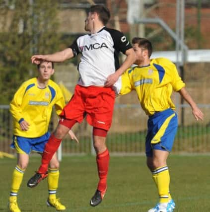 W13284H14-FootballLancing

Sussex County League  Football. Lancing v Horsham YMCA. Action from the match. SUS-140329-175108001