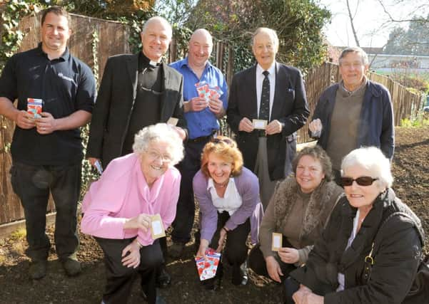 WH 010414  10,000 poppy seeds were sown at Ferring Village Green to commemorate the First World War