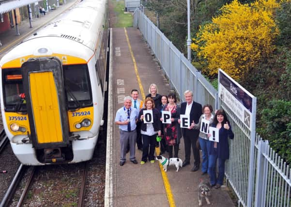 2/4/14- Commuters and local business leaders celebrating after the Battle railway line reopened SUS-140204-114135001