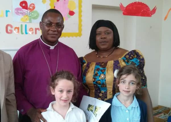 Bishop Dibo, mother Estelle, Jessica Inman and Tali Burrell