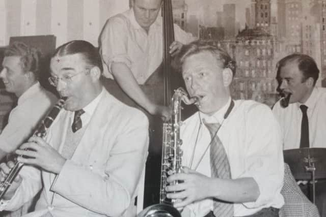 Johnny Haselip on sax with Bob Gaitley on the drums for a jam session. 
Feature on Top Hat. 
Photo from Chris Adam Smith SUS-140430-123848001