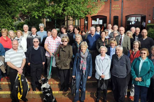 JPCT 290414 S14190471x Horsham District Council, North Horsham campaigners outside HDC offices -photo by Steve Cobb SUS-140430-174458001