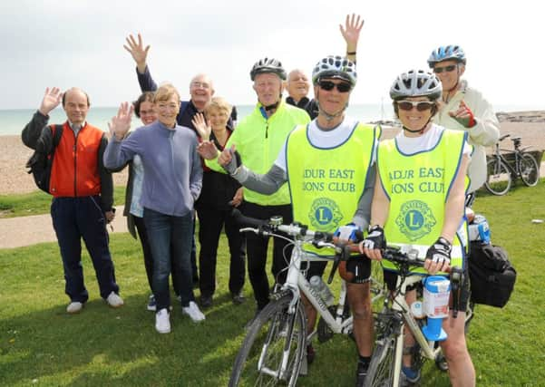 Friends and supporters greet the pair at Sea Lane CafÃ© in Goring, en route to Shoreham D14182246a