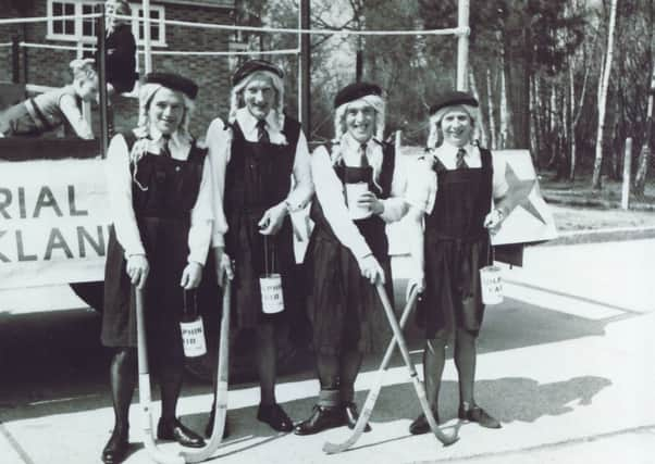 Jim Rutherford (far left), Bert Humphries (second left) and Gordon Holmes (far right) at the 1956 Dolphin Fair