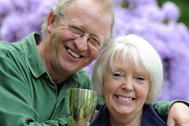 JPCT 090514 S14200346x Storrington. Rhododendrons. Andy and Jenny Fly,  with awards -photo by Steve Cobb SUS-140905-124808001