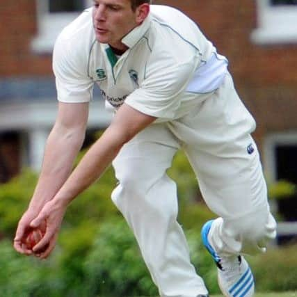 JPCT 100514 S14201347x Cricket. Wisborough Green v Henfield. Wis Green bowler Nick Klein -photo by Steve Cobb SUS-141205-090020001