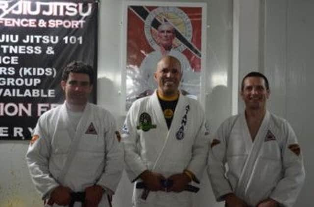 From left: Tom Watson, Royce Gracie, Paul Bridges (SUS-140514-090455002)