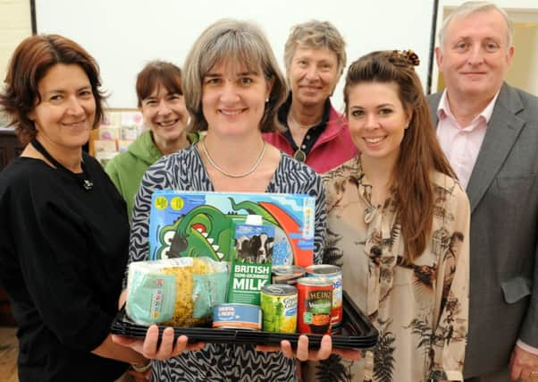 JPCT 160514 S14210092x Horsham Matters is setting up its fourth foodbank in the Horsham district, this time in Billingshurst, United Reformed Church, West Street. Giulietta Grover, Joy Harris, Ruth Hodgson Horsham District Foodbank Co-ordinator, Karen Goldsmith,  Bethany Taylor, Ian MacKlearn - photo by Steve Cobb SUS-140516-125042001