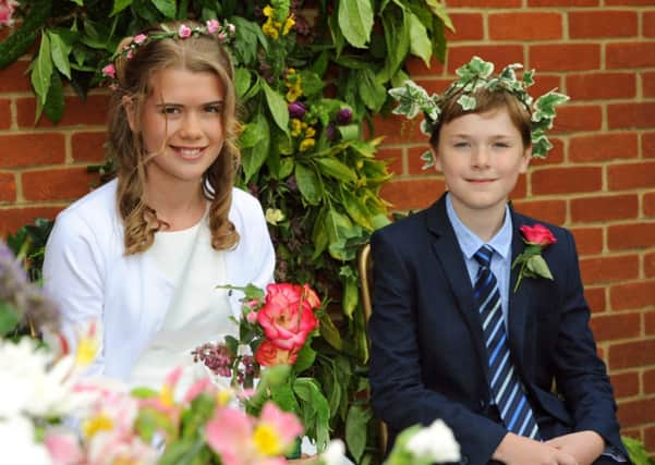 LG 230514 May Day celebration at St Wilfrid's Primary School's, Amgmering. May king and queen, James England 10 and Jassey Wilks 11. Photo by Derek Martin SUS-140524-001928001