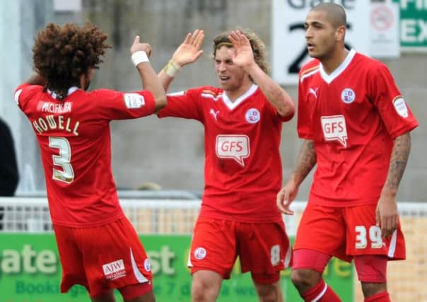 Sergio Torres celebrates his equaliser against Port Vale with Dean Howell and Leon Clarke (Pic by Jon Rigby) ENGSUS00220120318132821