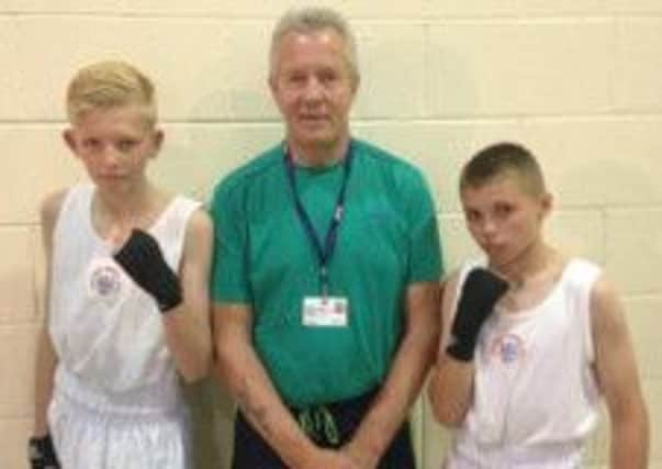 From left: William Badrock, coach Joe Lee and Toby Salmon