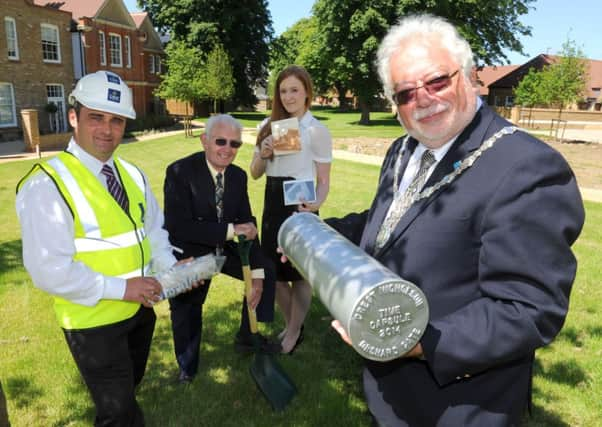 Site manager Nick Petrov, Malcolm Brett, marketing manager Caroline Tiernan and Mike Mendoza D14231919a