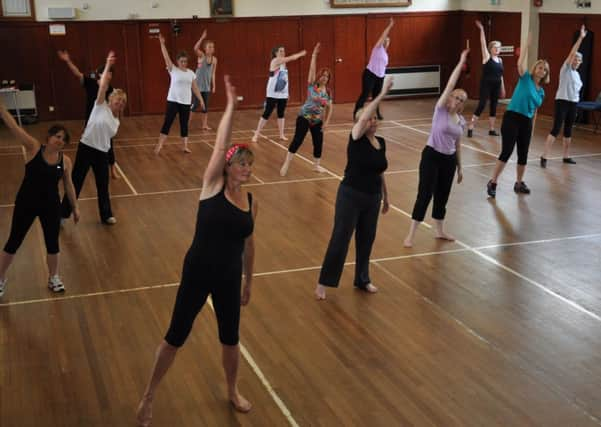 Members of The Fitness League who raised £2,000 on Sunday morning with three hours of exercise and dance. Half for BHF and half for St. Barnabas Hospice. Pic by Mike Beardall, Oakfield Media SUS-140623-155229001