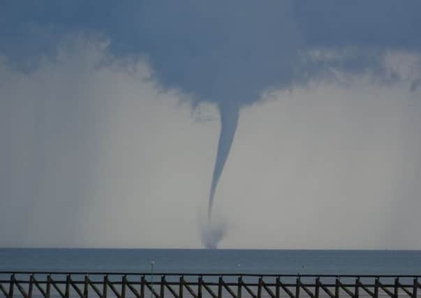 Daniel Burdfield captured this photo off Littlehampton beach of the waterspout near Bognor Regis SUS-140107-095048001