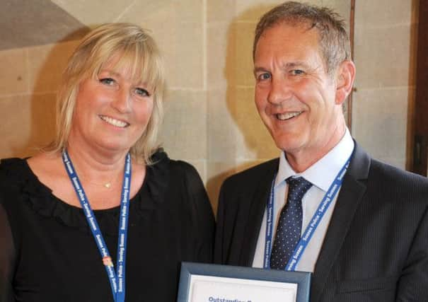 070714 Police Awards. PC Stephen Reed - Outsatnding Personal Responsibility award ( Chichester ) with colleague Siobhan Cunningham. Photo by Derek Martin SUS-140807-094714001