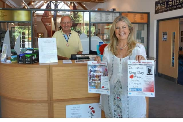 Singing for joy  Carolyn Gray, manager of Arundel Museum, pictured with the poster for the Come and Sing Day for the towns annual festival celebrations