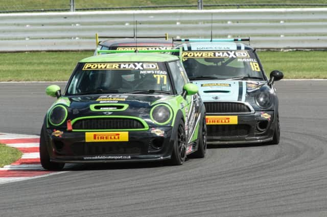 Neil Newstead leads a trio of tightly bunched cars. Picture courtesy Dave Young Photographics