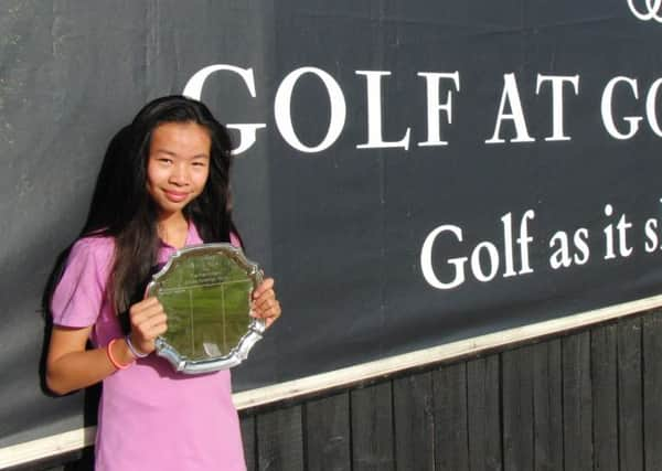 Yasmin Hang shows off her silverware