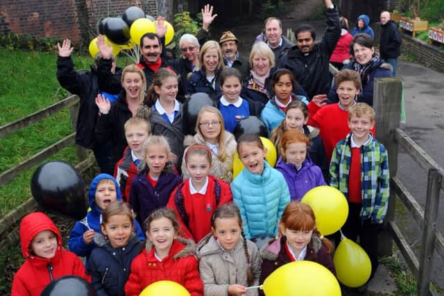 JPCT 211114 S14490147x The Old Railway Bridge Worthing Road Southwater. Community based project organised by the Parish Council in conjunction with the Schools of Southwater; Southwater Infant Academy, Southwater Junior Academy and Castlewood School. Bee Launch -photo by Steve Cobb SUS-141121-100405001