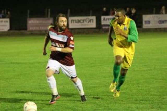 Jordan Woodley on the ball for Hastings United during their 2-1 loss at home to Walton & Hersham last weekend. Picture courtesy Joe Knight