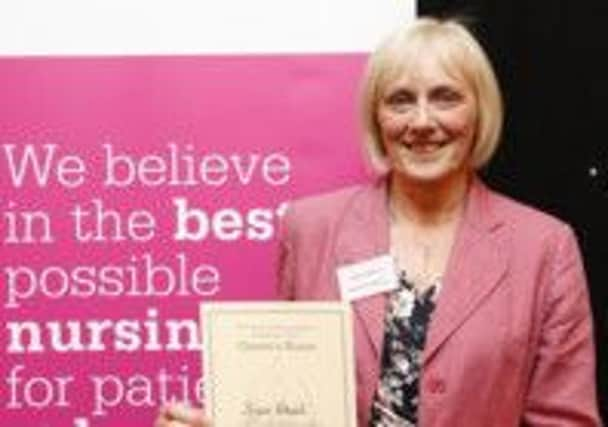 Joyce Skeet with her Queen's Nurse certificate