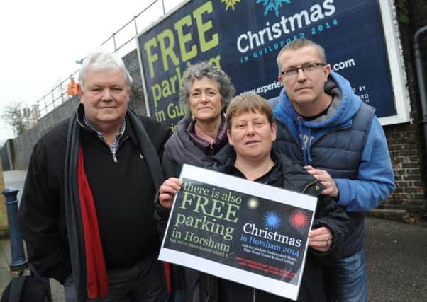 JPCT 261114 S14491198x Guildford advertisement causes upset with Horsham traders. John Le Rossignol, Fran White, PJ Aldred, Howard Bayliss -photo by Steve Cobb SUS-141126-115014001