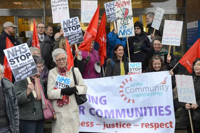 WH 261114 Anti-Bupa contract protest outside the CCG offices, Goring-by-Sea. Photo by Derek Martin SUS-141126-180411001