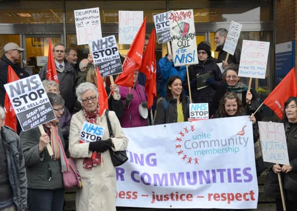 WH 261114 Anti-Bupa contract protest outside the CCG offices, Goring-by-Sea. Photo by Derek Martin SUS-141126-180411001