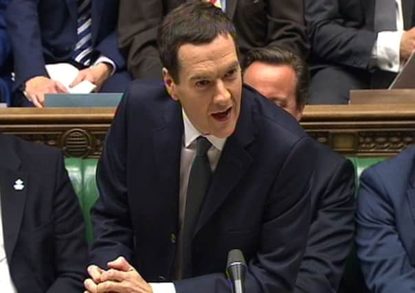 The Chancellor of the Exchequer, George Osborne delivers his Autumn Statement to MPs in the House of Commons, London. PRESS ASSOCIATION Photo. Picture date: Wednesday December 3, 2014. See PA story POLITICS Main. Photo credit should read: PA Wire