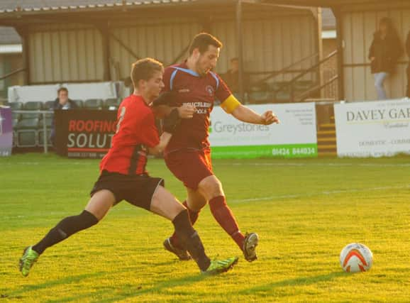 Steve Mote battles for the ball during Little Common's 2-0 at home to AFC Uckfield Town on Saturday. Picture by Steve Hunnisett (SUS-141129-170800002)