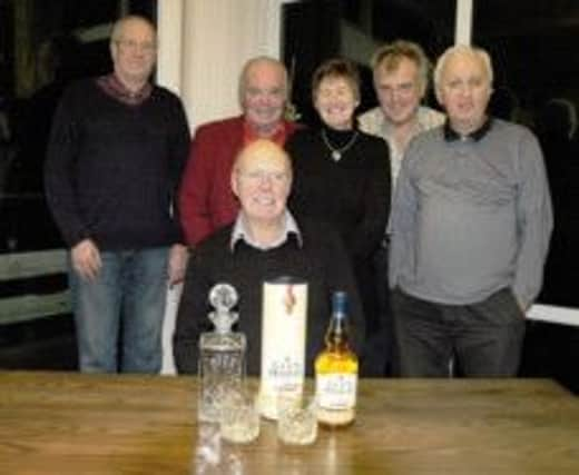 Ray Kidd in front and at the back from left  Chris Denyer ,squash club representative , Norman Birkett , club treasurer , Jane Seward , cricket club representative , Colin Rogers , new club chairman , and Jack Pearce , football club representative SUS-141112-094348001